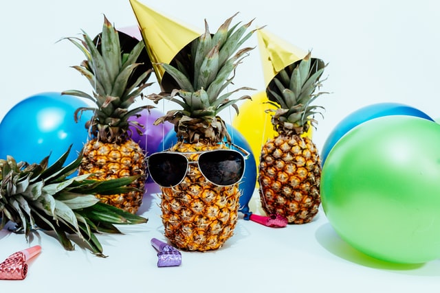pineapple wearing sunglasses, balloons