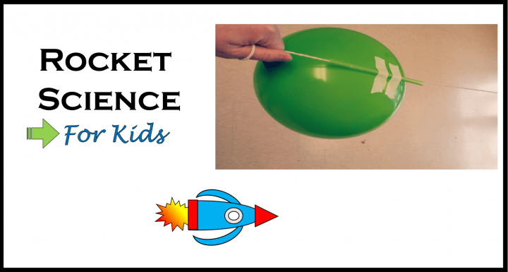 green balloon with a cord attached and a small cartoon rocket