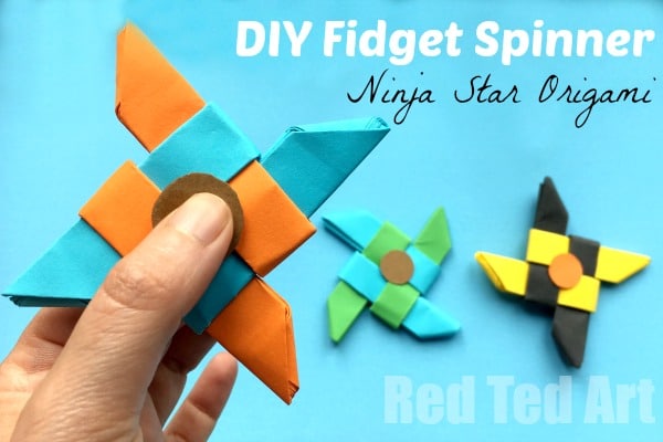 paper folded spinner in a hand