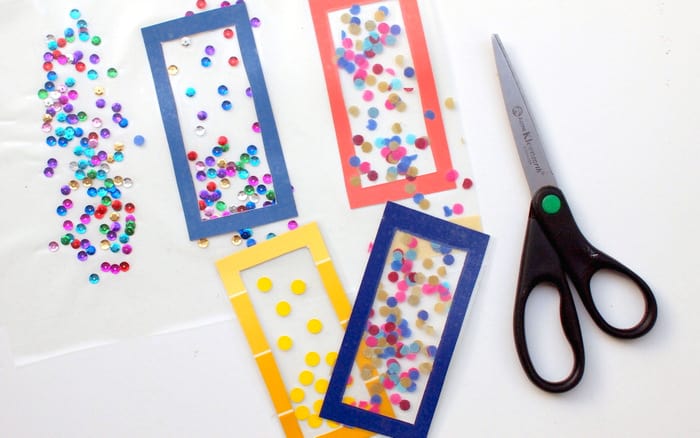 many colored bookmarks with scattered confetti