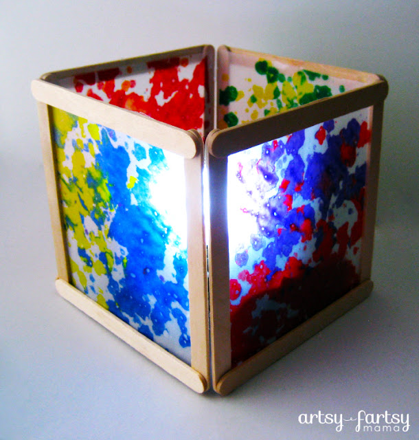 square box in shape of lantern with multi colored sides