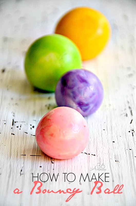small, multi colored homemade balls on a table