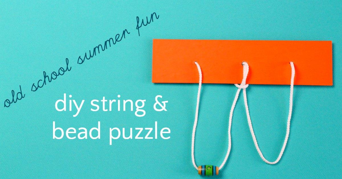 orange string and bead puzzle on blue background